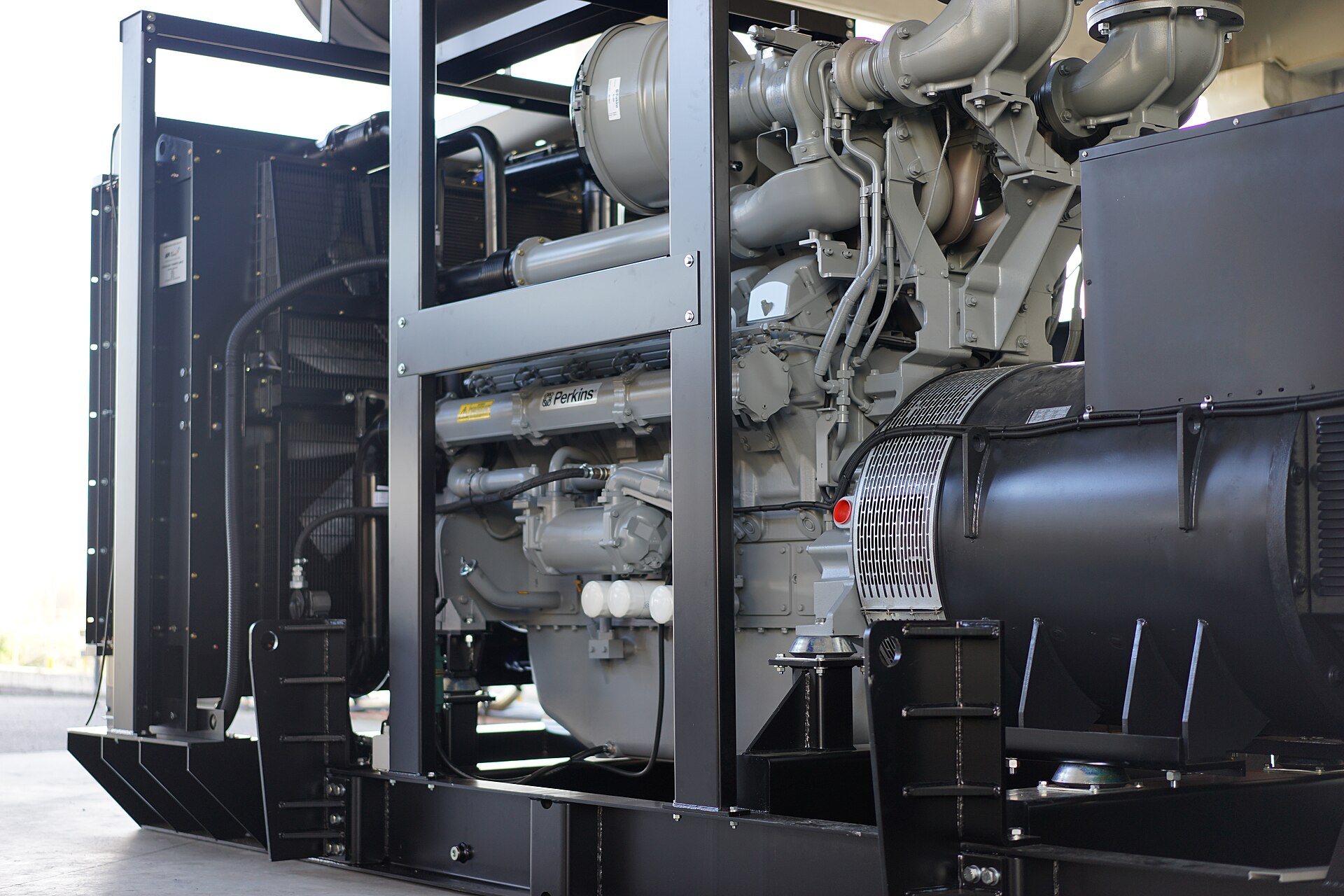 Perkins diesel generator set with engine and alternator on a steel skid