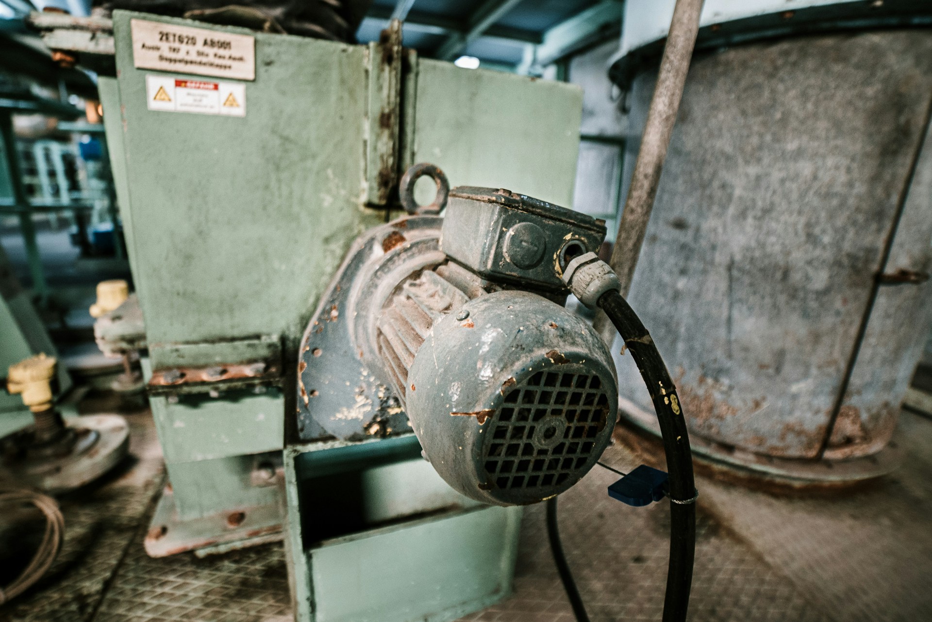 Industrial electric motor mounted on plant machinery